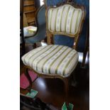 A Victorian walnut and upholstered side chair