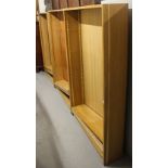 A set of 3 light oak floor standing open bookcases with adjustable shelves, each 91cm wide