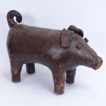 A leather-covered model pig footrest purchased from Liberty's in the 1960s, length 47cm