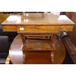 A late Victorian rosewood and satinwood-banded sewing table, with 3 fold-out tops, raised on