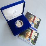 A Golden Jubilee silver £5 coin, encapsulated, with original box