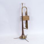 A Buescher Aristocrat gold lacquered 3-valve trumpet, serial no. 623353, length 55cm, in original