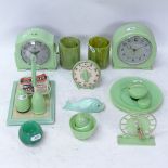 A collection of Art Deco green plastic kitchen items, including egg boiler, Smith's timer etc