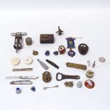 Various interesting collectables, including novelty bone fishing reel measuring tape, papier mache