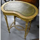 An Antique carved giltwood kidney-shape side table, with applied decoration, interwoven cross