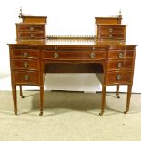 A fine quality Edwardian Maple & Co mahogany Carlton House style serpentine-front writing desk, with