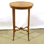 An Edwardian satinwood oval occasional table, with inlaid top and carved cross-stretcher, 41cm x