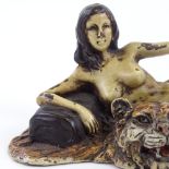 A Bergman style cold painted bronze reclining nude on a tiger skin rug, modern, length 15cm