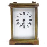 A French brass-cased carriage clock in leather travelling case, height 11cm