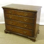 An oak chest of 4 long graduated drawers with fluted corners, width 100cm