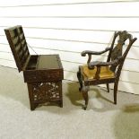 A Chinese hardwood scribe's travelling writing desk, the writing top high relief carved with