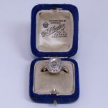 A Victorian 14ct gold diamond cluster ring, set with a central rose-cut diamond, in silver mount