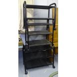 3 black metal mesh trolleys