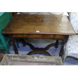 An 18th century oak side table, with single frieze drawer, on X-shaped stretcher and turned legs,