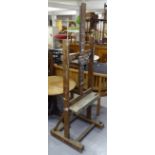 An Edwardian oak artist's easel, W57cm