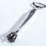 DANSK GULDINOUSTRI - a mid-century sterling silver-handled bottle opener, with crown finial