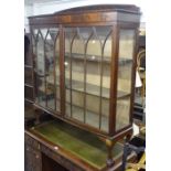 A 1930s walnut bow-front display cabinet, with 2 glazed doors, W120cm