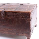 An Antique Moroccan? carved wood box with iron strapwork, width 36cm