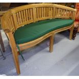 A banana wood garden bench and cushion