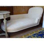 An Edwardian upholstered chaise longue