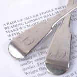 Political interest, a pair of silver Fiddle pattern table spoons, with inscriptions for T&G Hawkes
