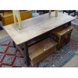 An Arts and Crafts oak refectory dining table, in the manner of Liberty, scrubbed oak top on sloping