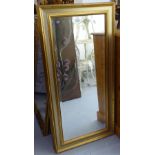 A pair of modern gilt-framed bevelled-edge wall mirrors