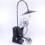 A novelty Vintage Specto film projector converted to a table lamp, with bird cage bulb, overall