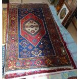 A red ground Beluchi rug, 205cm x 120cm