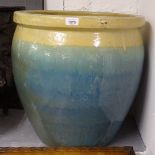 A glazed terracotta garden planter pot, H51cm