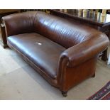 A late Victorian brown leather upholstered Chesterfield settee, L185cm (reupholstered)