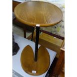 A contemporary designer side table on cloven-shaped base, height 63cm