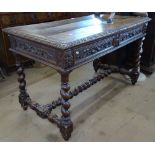 A Victorian oak centre standing writing table, with 2 frieze drawers, allover carved decoration,