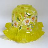 A yellow glass light shade with floral decoration, height 16.5cm