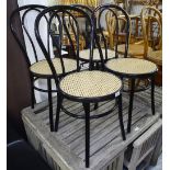 A set of 4 black metal bentwood style cafe chairs