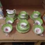 A 1930s Staffordshire tea set with floral and gilded decoration