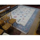 A large cream and blue ground flat weave Kilim carpet, 350cm x 280cm