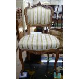 A Victorian walnut and upholstered side chair