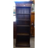 A reproduction mahogany and satinwood-banded open bookcase, with adjustable shelves, and marquetry