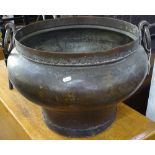 A large 2-handled brass cooking pot