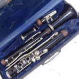 A Vintage French Kandowski ebonised clarinet, in hardshell carrying case