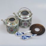 2 Chinese Canton teapots, tallest 14cm, an iron trivet and 2 spoons