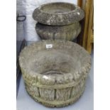 A weathered concrete garden pot, and another (2)