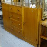 A mid-century oak veneered break-front sideboard, W136cm