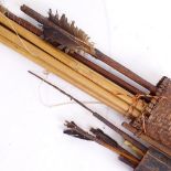 2 African Tribal quivers, containing various arrows and carved bamboo spears