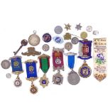 A collection of silver and white metal Order of Buffalos Masonic jewels, British coins etc