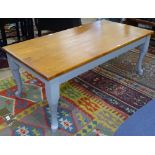 A rectangular polished beech-top and painted coffee table, on cabriole legs, W120cm