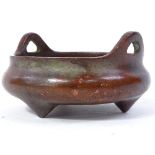 A small Chinese polished bronze incense burner, Zhuanshu seal form script mark on base, diameter 9cm