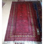 A red ground Turkey rug, 205cm x 115cm