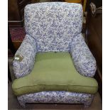 An Edwardian upholstered armchair